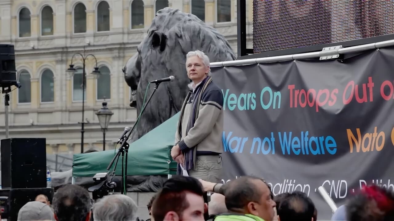 The Trust Fall: Julian Assange backdrop