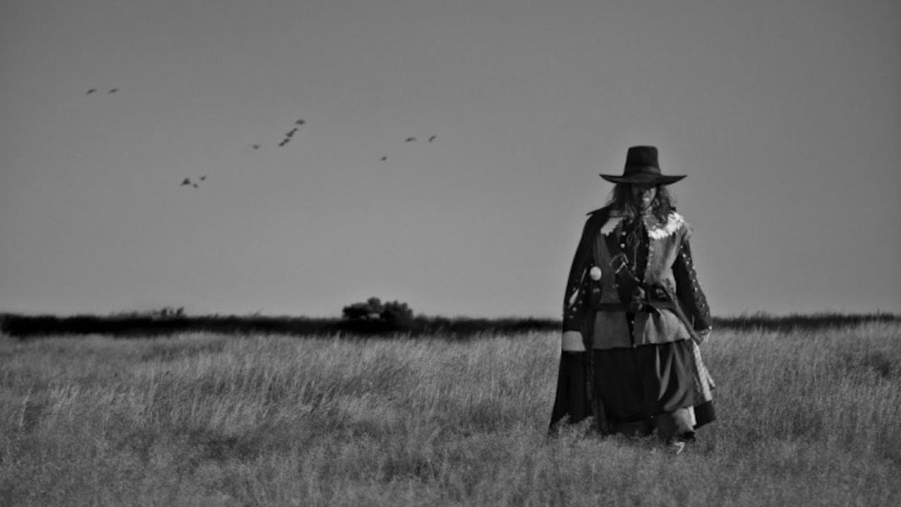 A Field in England backdrop