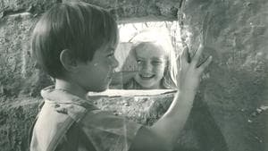 The Boy and the Ball and the Hole in the Wall backdrop